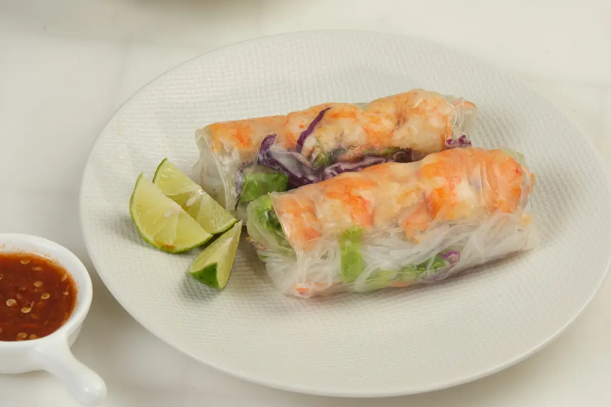 Delicious homemade shrimp spring rolls on a serving plate